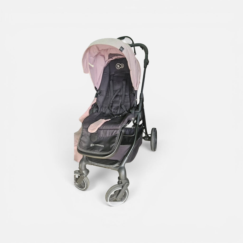 Carucior sport Kinderkraft Vesto, în varianta de culoare roz cu cadru negru.